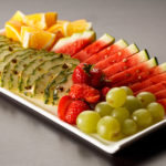 A plate of appetising mixed fruit including pineapple, strawberries, grapes, water melon and orange segments as part of mercure hotels meeting food offering